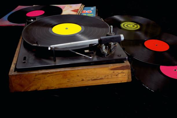 istock an antique record player with different vinyl records 2175481214