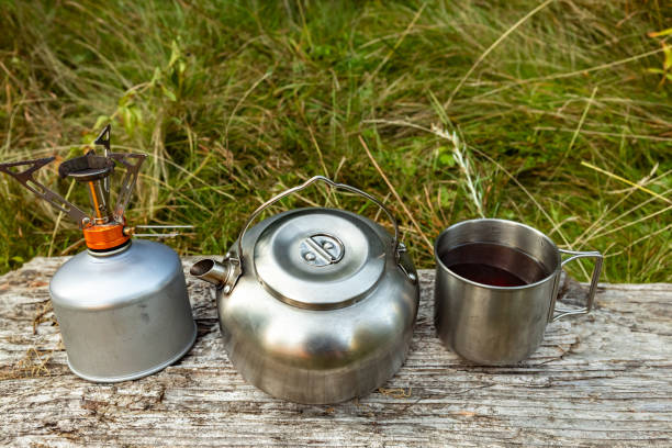 istock Camping with a tent and cooking equipment in the mountains. 2175496241