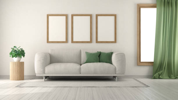 istock Modern living room with white sofa, green curtains and empty frames hanging on the wall 2175507367