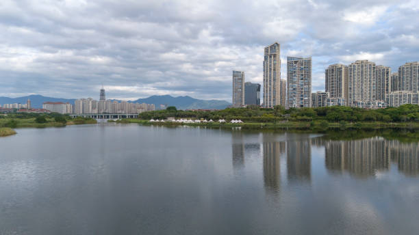 istock Lakeside city at dawn 2175510257