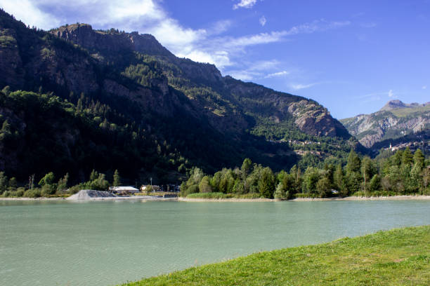 istock Green alpine lake in summer 2175514381