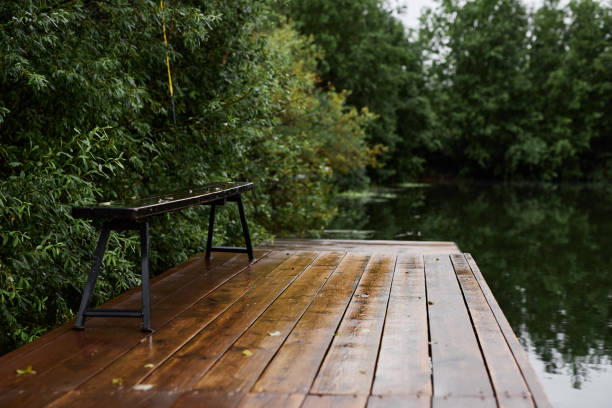 Bamboo dock in a green lake