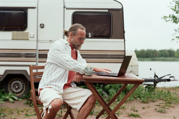 istock Film Image of Man using Laptop by Van 2175517386