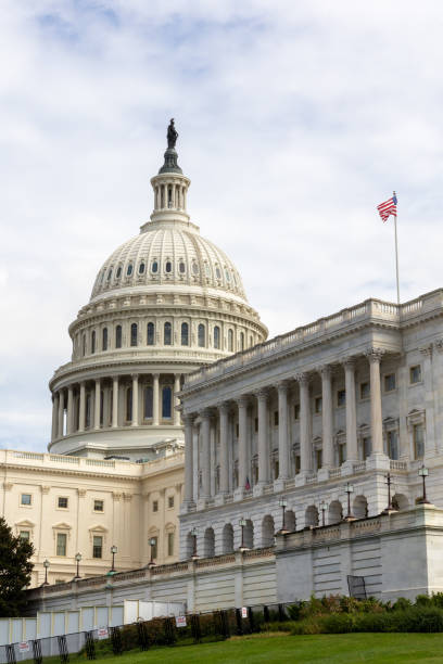istock US Capitol building under cloudy skies 2175517971