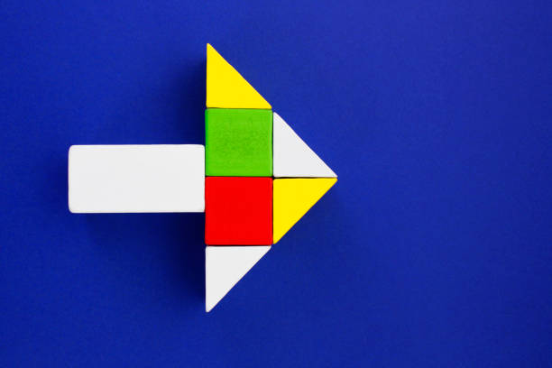 Arrow formed with colorful geometric figures