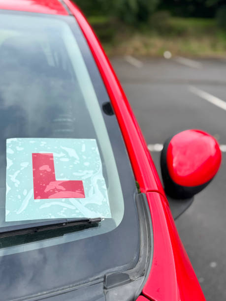 istock Image of l-plate car with windshield signifying a learner driver / a representation of the thrilling experience of embarking on a driving journey 2175520714