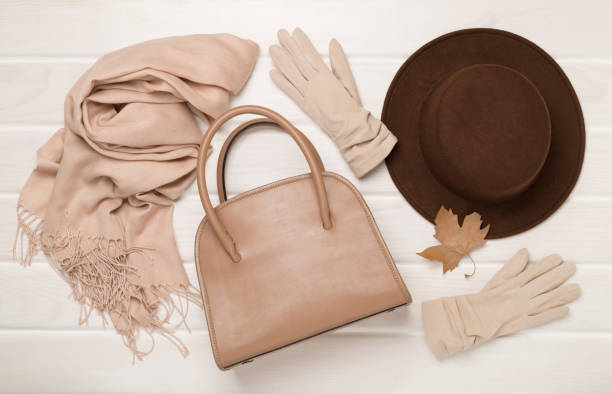 istock Stylish autumn accessories on wooden background, top view 2175521982