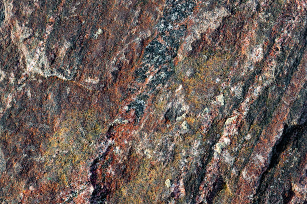 istock Rough texture of natural stone, red granite rock 2175528625