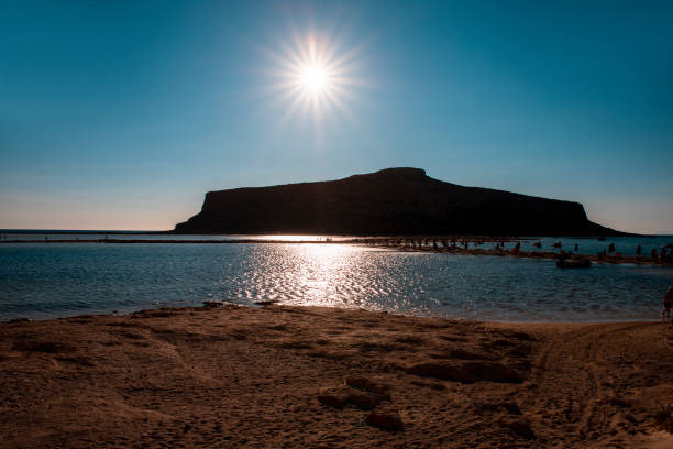 Sunset at the tropical island of Balos in turquoise water lagoon \nCrete ,Greece
