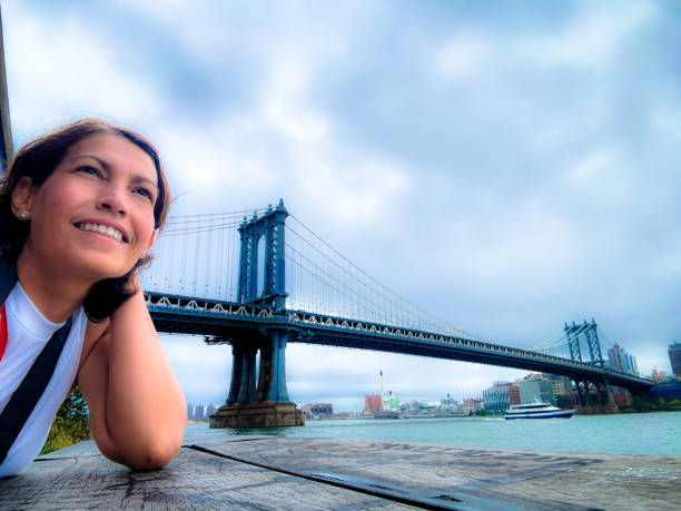 istock Woman enjoying views from Manhattan 2175535828