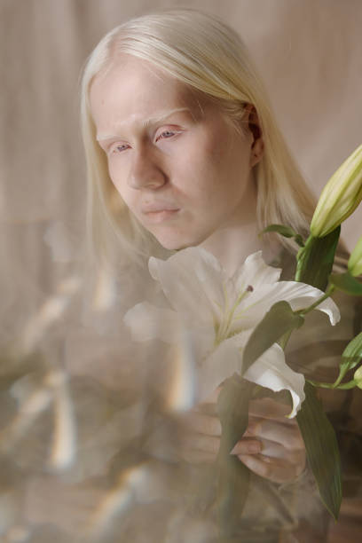 istock Unusual Girl With Lily Flowers 2175537121