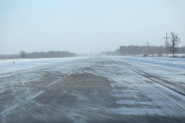 istock Blowing Snow on Highway in Winter 2175537509
