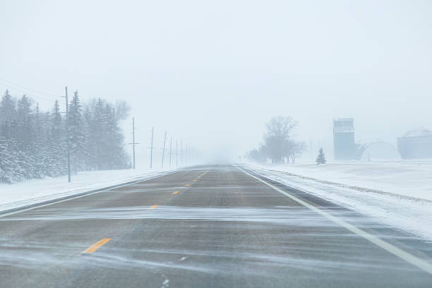 istock Blowing Snow on Highway in Winter 2175537519