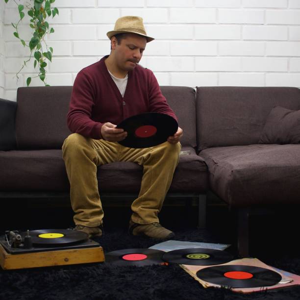 istock a seated man with a hat and a cigarette reviews vinyl records 2175539183