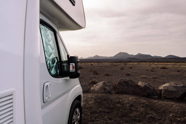 istock motorhome parked against mountains 2175541624