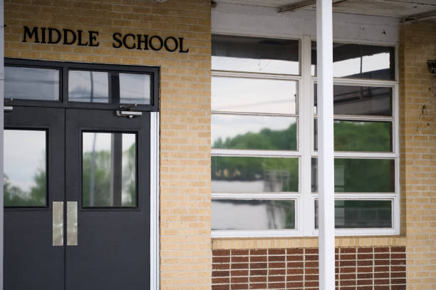istock Middle school sign near entrance 2175541833