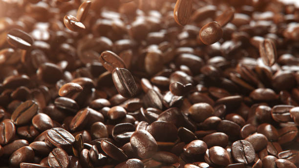 Close up Detail Shot of Coffee Beans Falling Down isolate on black background. 3D Render.