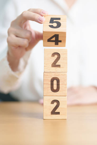 istock 2024 change to 2025 year block on table. goal, Resolution, strategy, plan, start, budget, mission, action, motivation and New Year concepts 2175545544