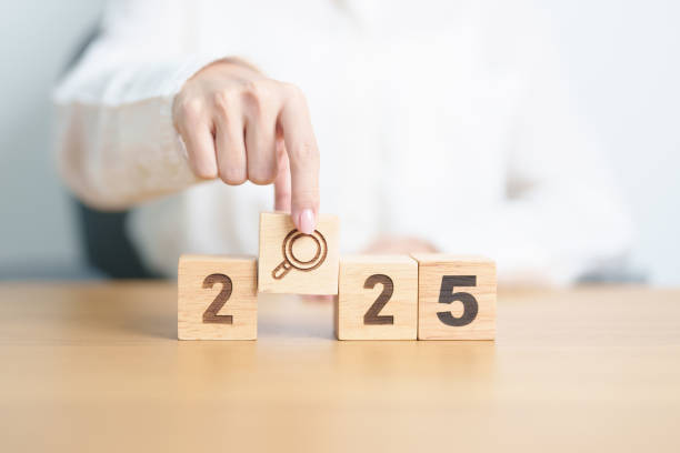 istock 2025 block with magnifying glass icon. SEO, Search Engine Optimization, hiring , Advertising, Idea, Strategy, marketing, Keyword, Content and New Year start concepts 2175545604
