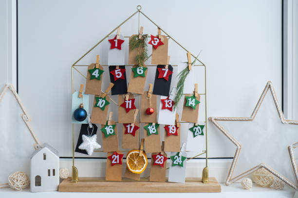 istock Traditional twenty four days advent calendar before Christmas holidays. Plastic free zero waste sustainable decoration. Winter cozy home Catholic traditions of Christmas countdown new year 2175556004