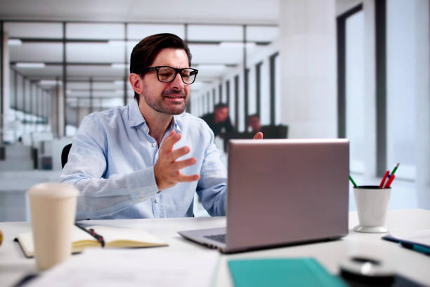 istock Upset Worried Man Using Laptop 2175556687