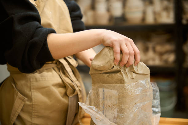 istock Craftswoman at her workplace in a ceramics studio 2175557587