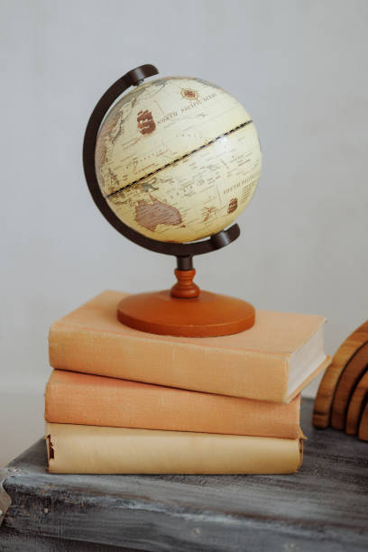 istock A globe sits on top of a stack of books 2175561900
