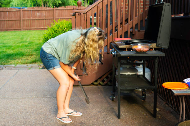 istock Female grilling steak pieces 2175563825