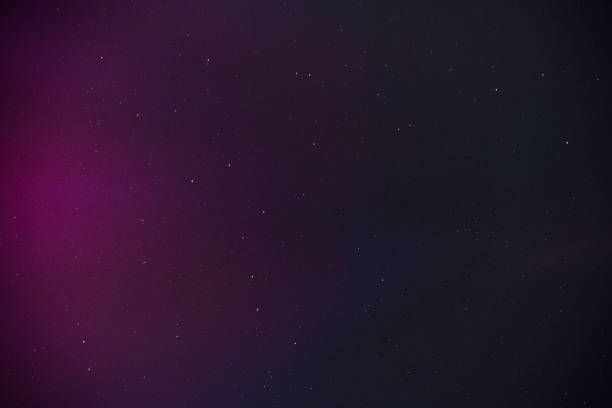 Pink northern lights aurora unusual sky in the Midwest, Indiana, USA