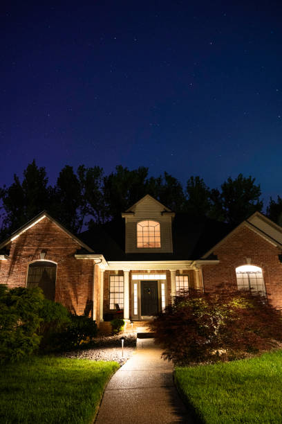 istock Ranch home at night under the stars 2175563853
