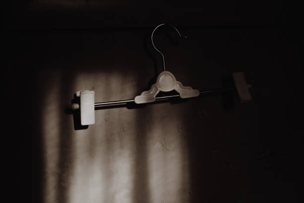 istock A clothes hanger hanging on a nail, A clothes hanger that hangs on a nail 2175566535