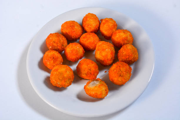 istock Close up of fried chicken nuggets on a ceramic plate 2175567995