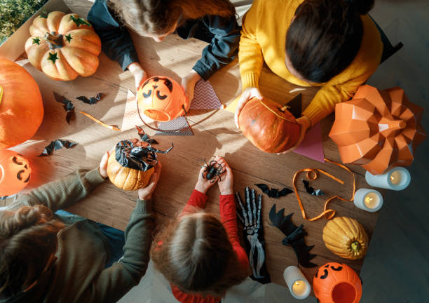 istock Happy family preparing for Halloween. 2175570389