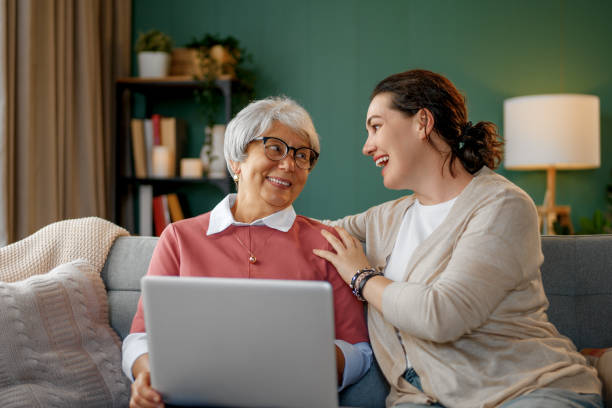 istock Young and senior women are using laptop 2175570839