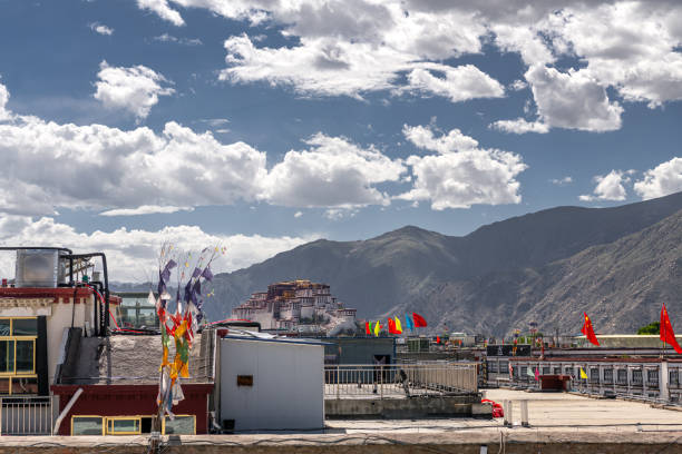 The Potala Palace in Lhasa set against Himalayan mountains. TibetThe historic residence of the Dalai Lama of Tibet, constructed from 1645 - now a museum that dominates the skyline of Lhasa