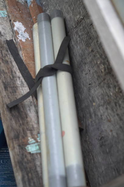 istock A bundle of weathered PVC pipes tied together 2175573469