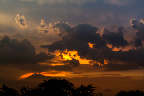 Majestic Sunset Sky with Dramatic Clouds and Fiery Horizon
