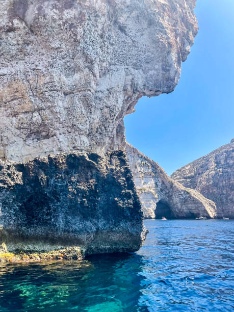 istock Sharp rock cliff in the beautiful and quiet shore Mediterranean waters in Malta Island 2175575396