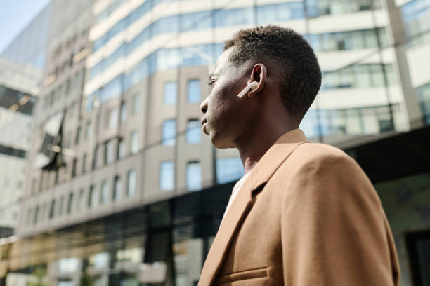 istock Man Listening To Music On Way To Work 2175578118