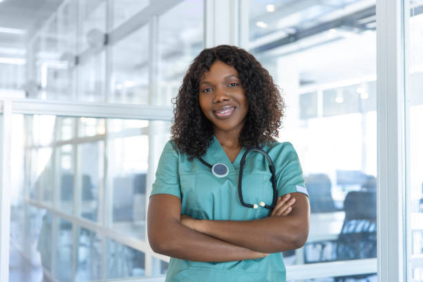 istock Confident good-looking african american young doctor in a lab coat 2175579687