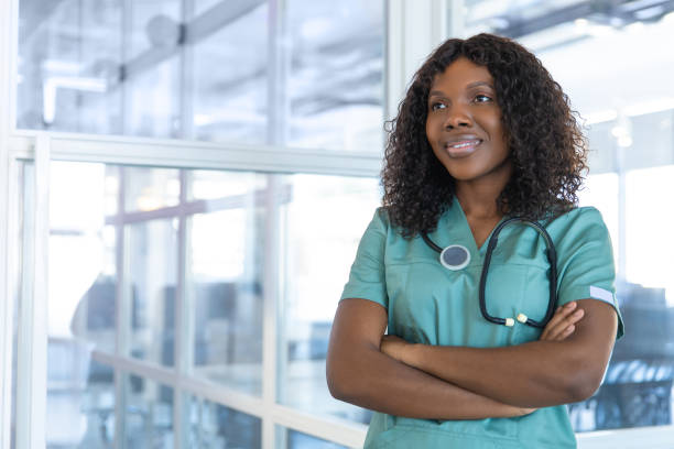 istock Confident good-looking african american young doctor in a lab coat 2175579697