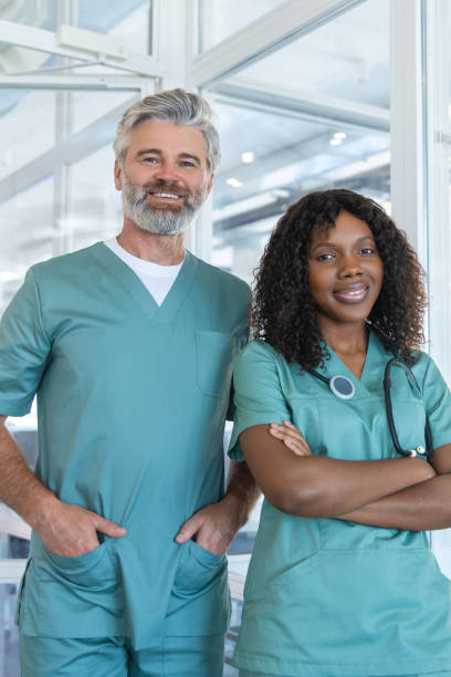 istock Two doctors looking contented and confident while standing in the hospital corridor 2175579706