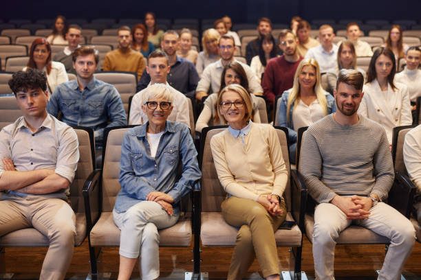 istock Crowd of people attending a seminar in convention center. 2175579792