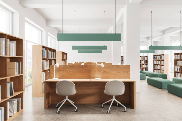 istock Stylish library interior with work and relax zone, shelf and panoramic window 2175581547