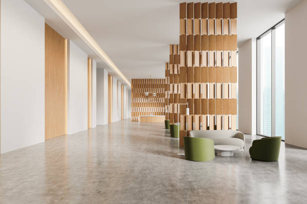 istock Stylish office interior with reception desk and chill zone, panoramic window 2175581695