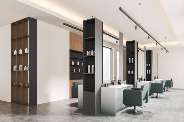 istock Modern salon interior with armchairs, shelf with accessories and window 2175581850
