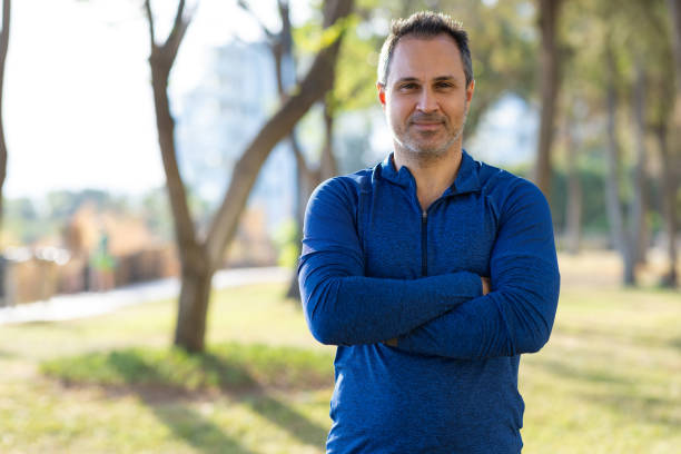 istock Smiling man with crossed arms smiling 2175583568