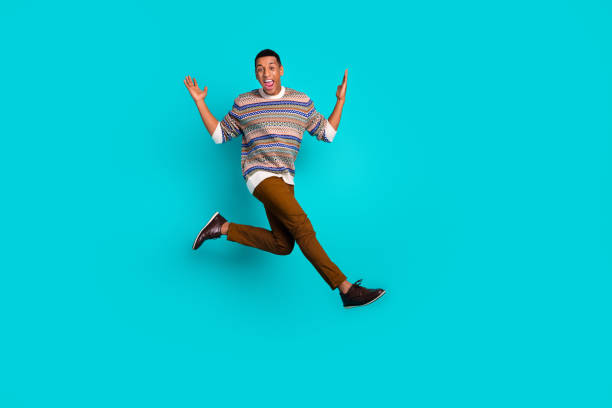 istock Full body portrait of nice young man jump empty space wear pullover isolated on turquoise color background 2175586214