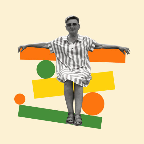 istock Middle age woman balancing on multicolored figures of different shapes. 2175586376