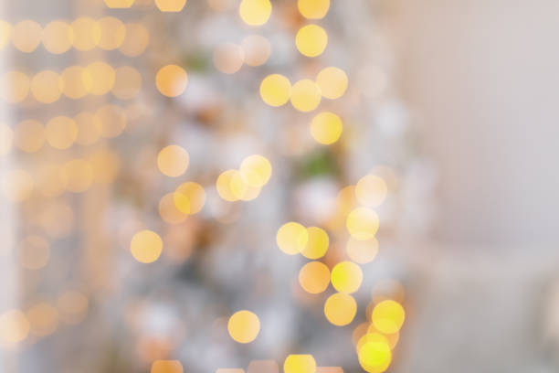istock blurred chtistmas interior with golden lights 2175588235